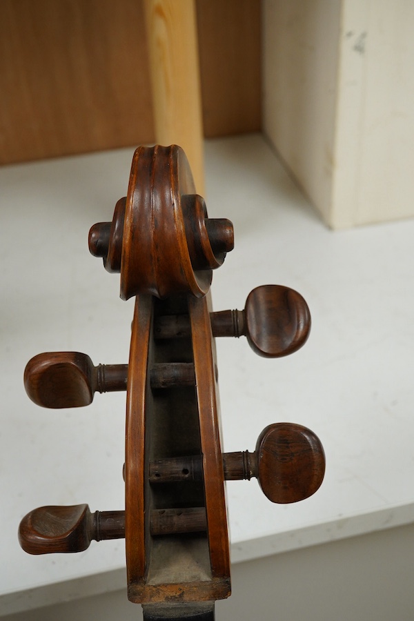 An early 19th century English cello for restoration, body length 74.5cm, together with an ebonised wood W.E. Hill & Sons case. Condition - poor to fair.